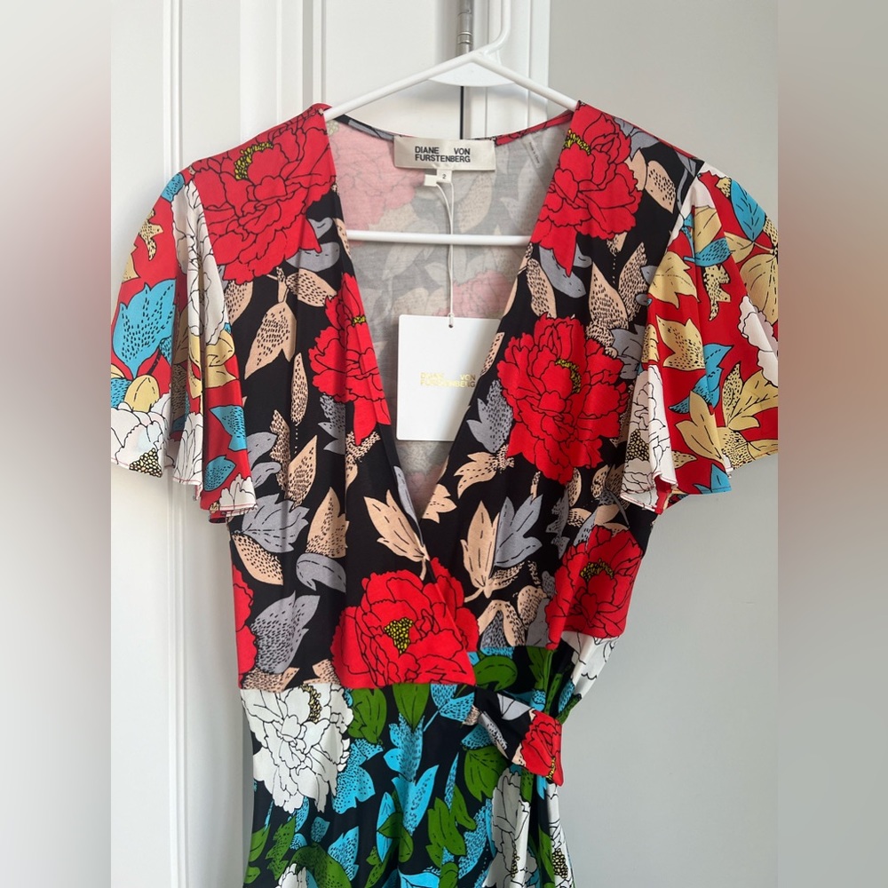 Diane Von Furstenberg wrap dress, size 2. Brand new with tags.